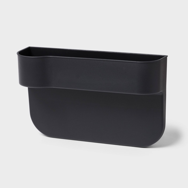 Black Brightroom rigid plastic car seat gap organizer with an open top.