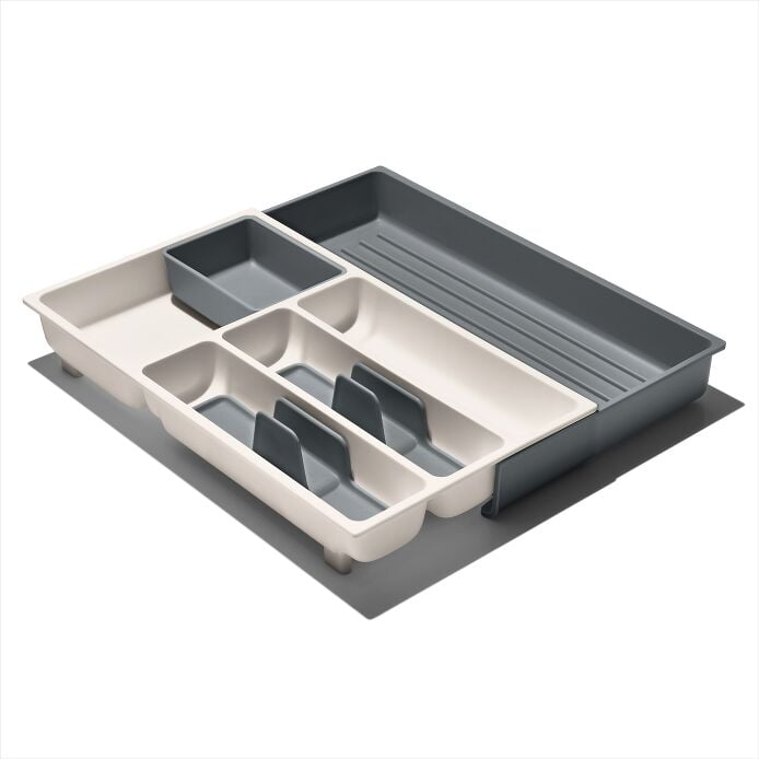 OXO Good Grips expandable utensil drawer organizer SKU 13321900 shown empty and expanded on a white background.