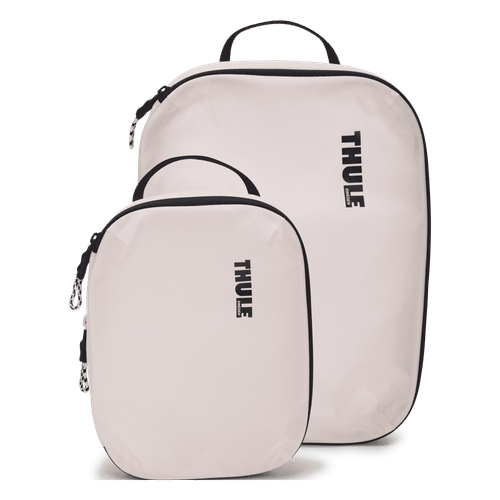 White Thule Compression Cube Set model 3204860 shown as one small and one medium packing cube.