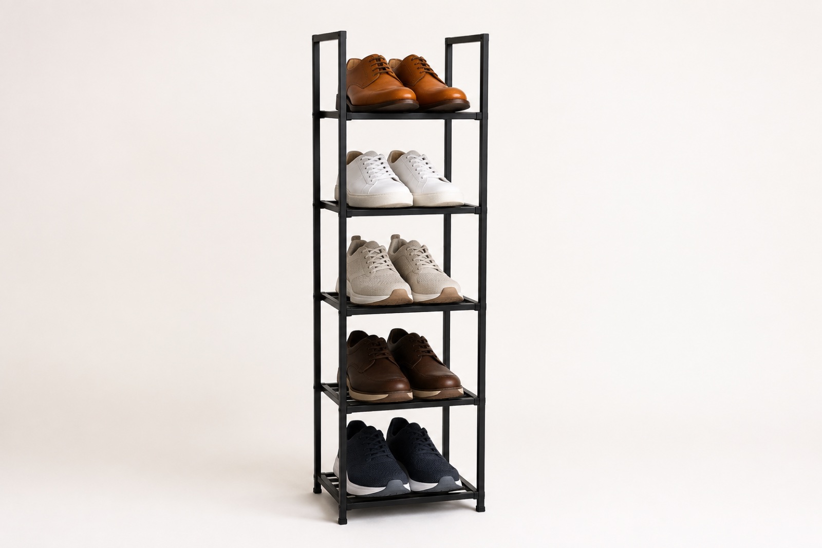 Original unbranded illustration of a narrow black five-tier vertical shoe tower holding five ordinary shoe pairs on an off-white background.