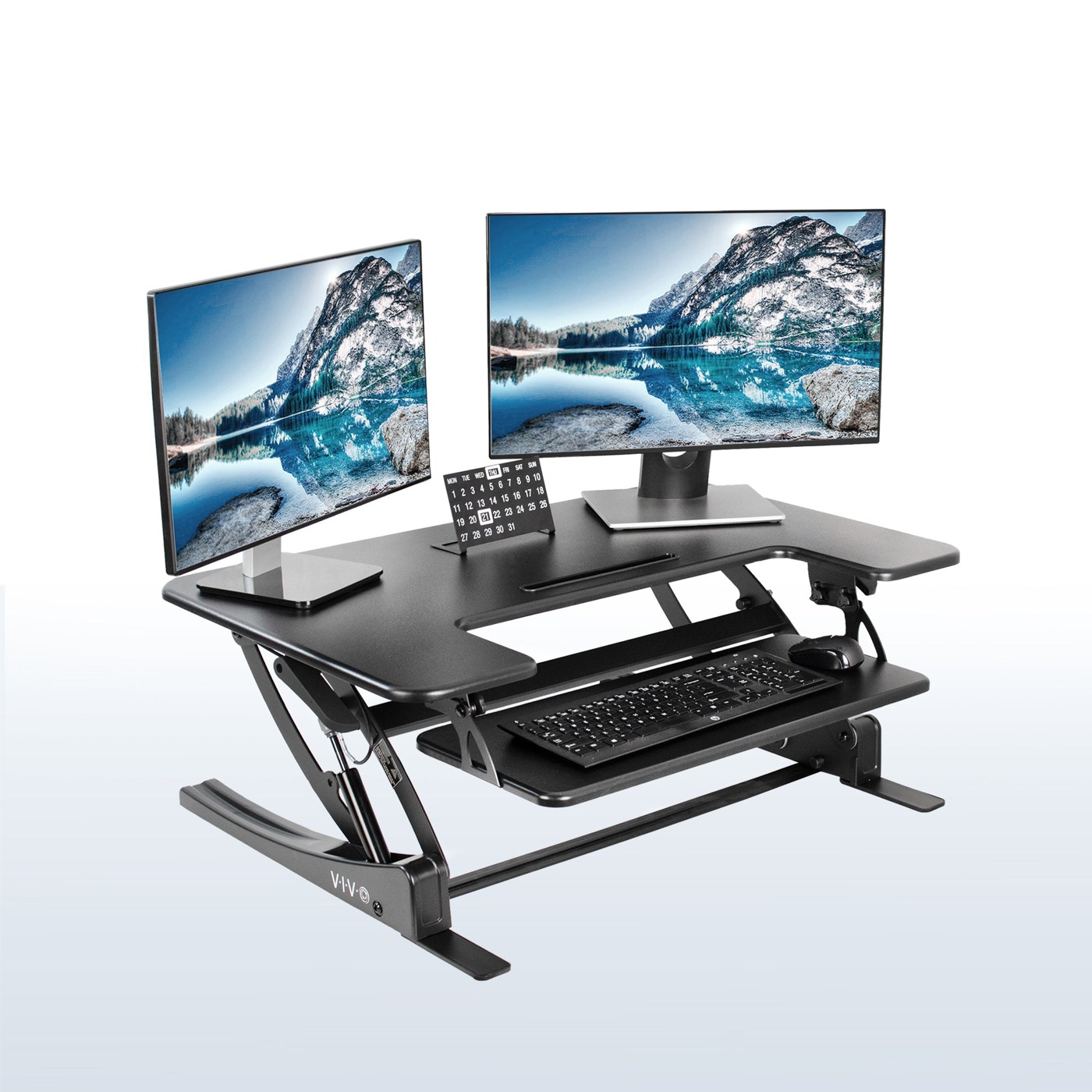 VIVO manufacturer photo of DESK-V000V with display accessories; monitors and keyboard are not included.