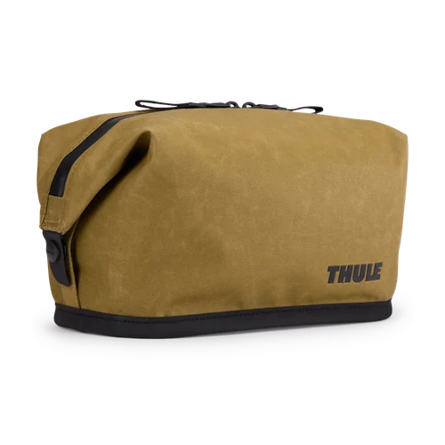 Nutria brown Thule Aion Toiletry Bag model 3205228 shown upright on a transparent background.