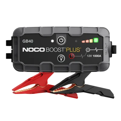 Black NOCO Boost Plus GB40 portable jump starter with its battery clamps on a transparent background.