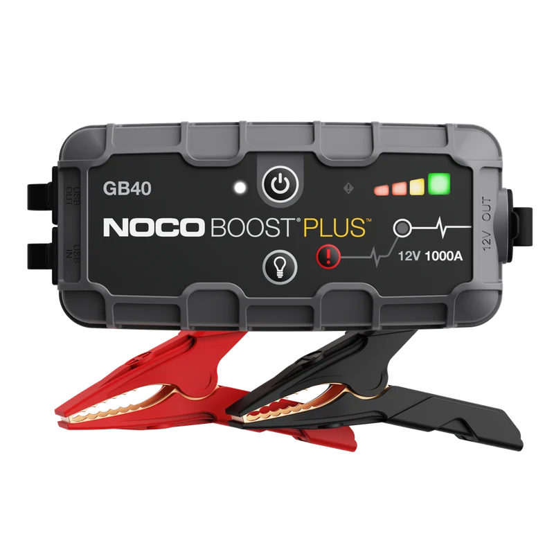 Black NOCO Boost Plus GB40 portable jump starter with its battery clamps on a transparent background.