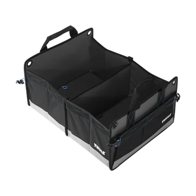 Black Thule Go Box Large model 306930 shown open with dividers on a white background.