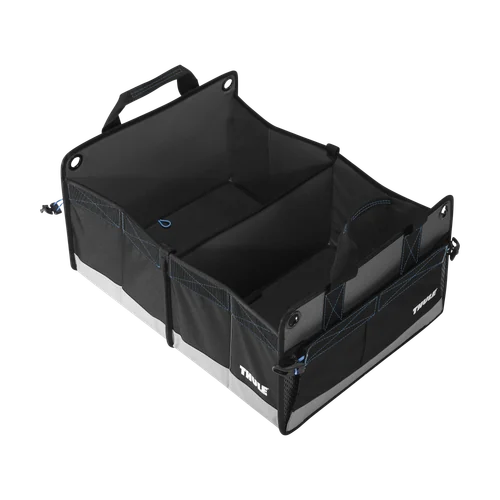 Black Thule Go Box Large model 306930 shown open with dividers on a white background.