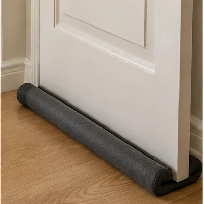 Original unbranded illustration of a dark fabric double-sided sleeve fitted beneath a white interior door.