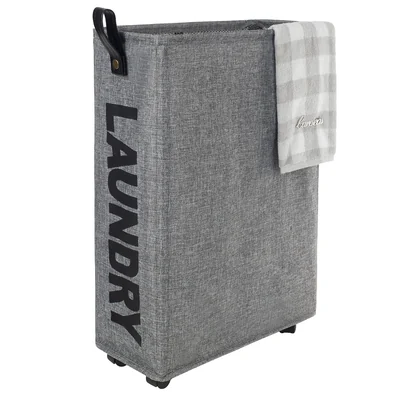 Gray Caroeas narrow fabric laundry hamper with four small wheels and a tall rectangular body.