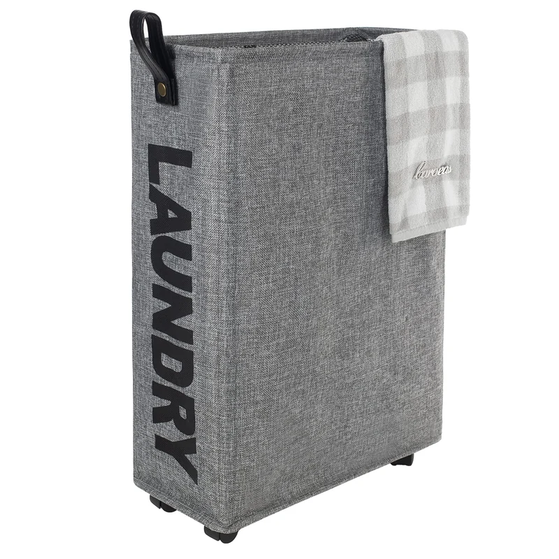 Gray Caroeas narrow fabric laundry hamper with four small wheels and a tall rectangular body.
