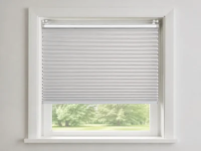 Original unbranded format illustration of a silver-white cordless cellular shade held inside a white window recess by a pressure-fit headrail.