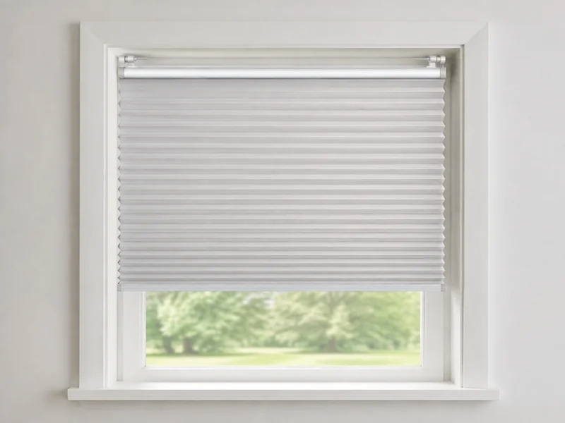 Original unbranded format illustration of a silver-white cordless cellular shade held inside a white window recess by a pressure-fit headrail.